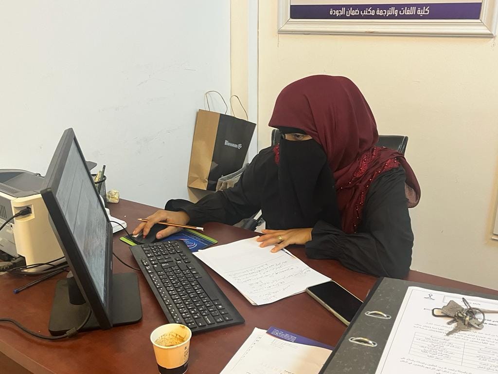 فريق الجودة في تجهيز ملفات الاعتماد المؤسسي بكلية اللغات والترجمة