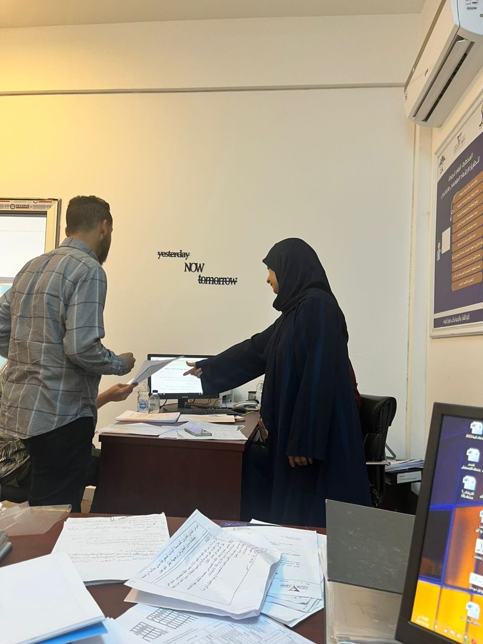 فريق الجودة في تجهيز ملفات الاعتماد المؤسسي بكلية اللغات والترجمة